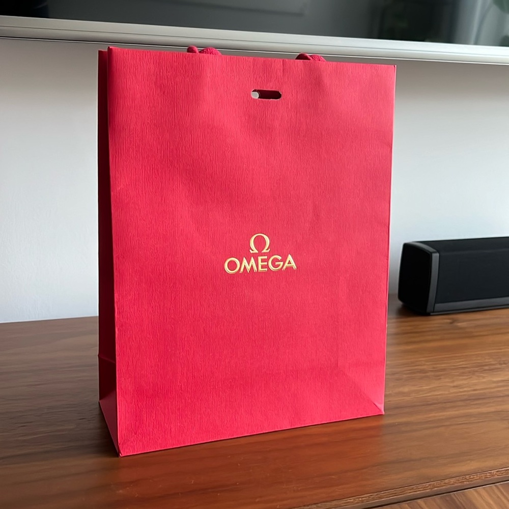 Omega store paper shopping bag